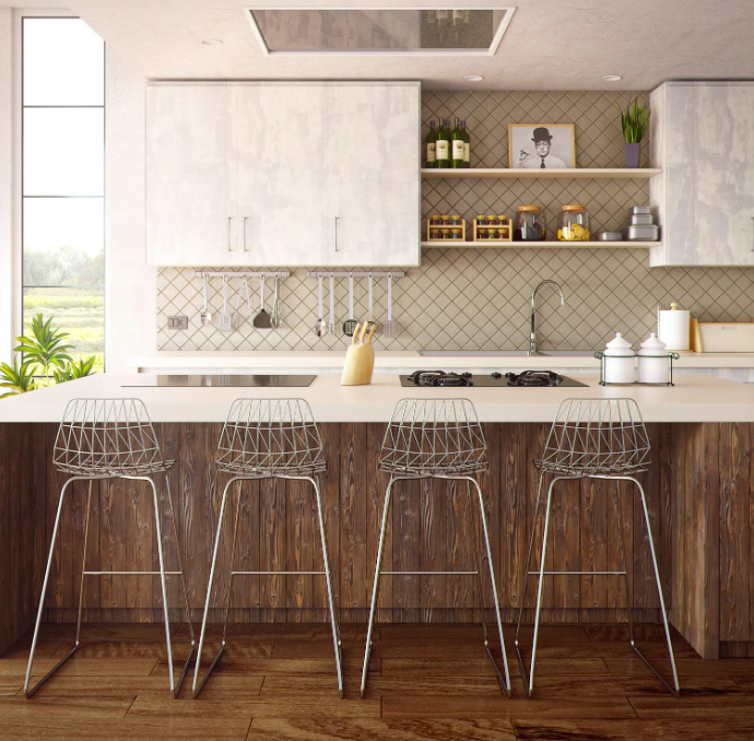 Kitchen island with a light countertop and dark wood base
