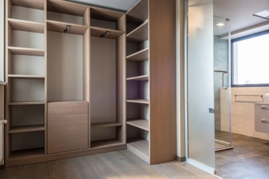 Organized walk-in closet with various storage solutions