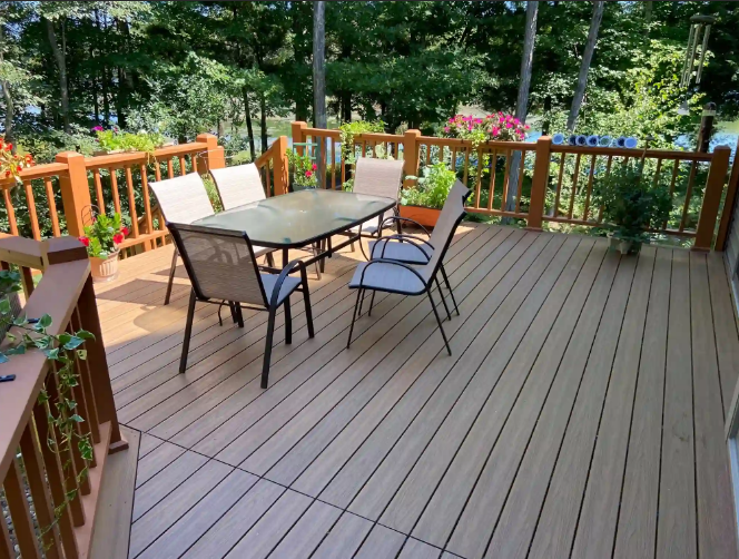 An image of a remodeled deck in the backyard of a Rhinelander home.