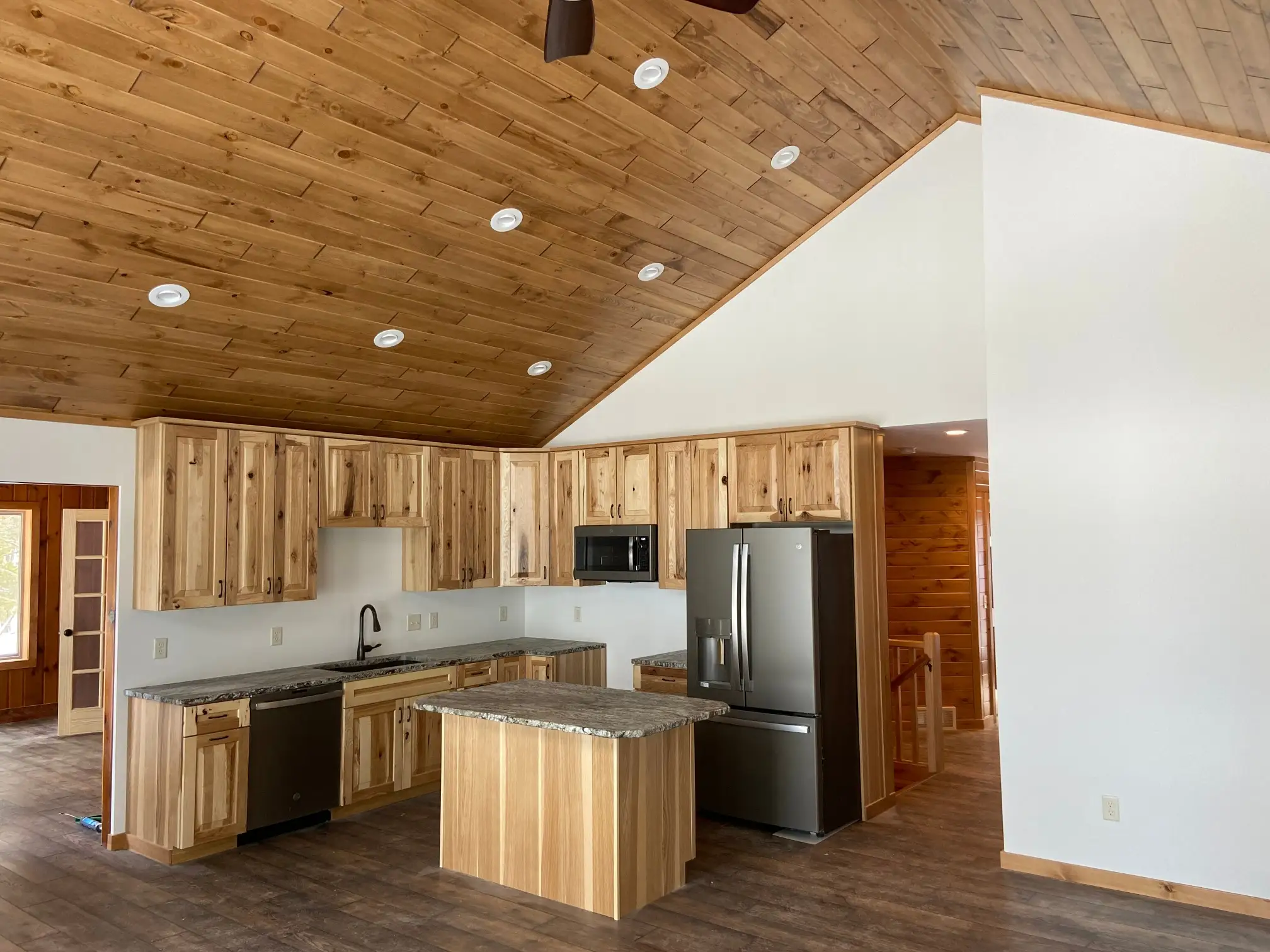 An image of an open kitchen in a Northwoods home