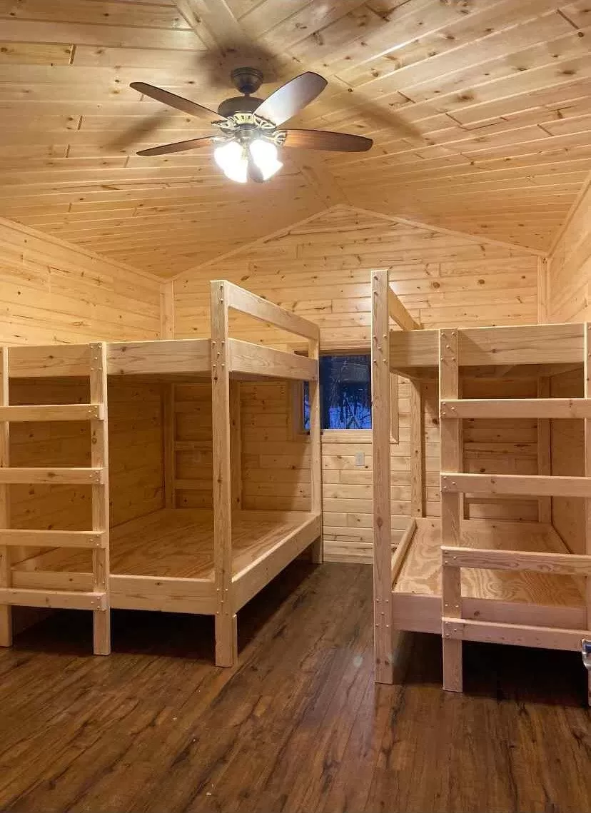  A bunk bed with extra storage space.